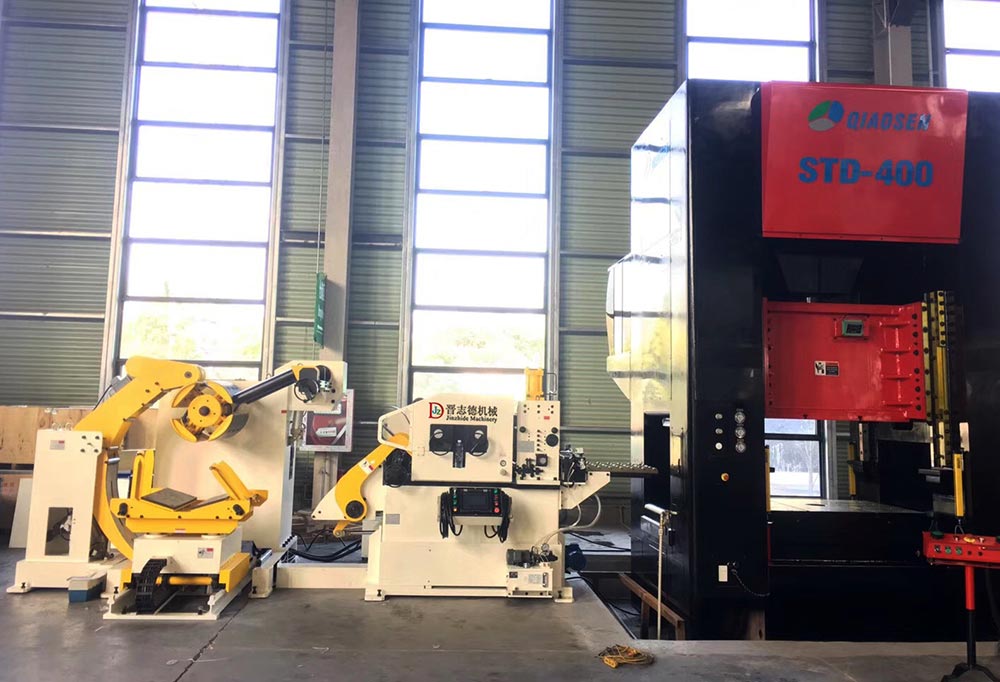 厚板三合一送料機應(yīng)用,汽車制動臂沖壓